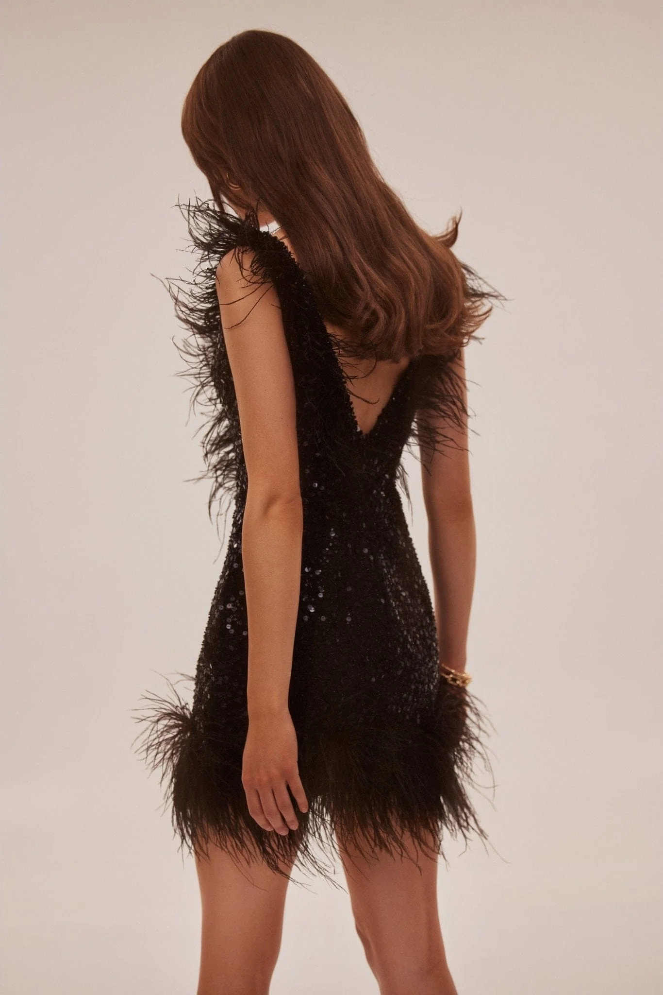 Dramatic cocktail dress on straps decorated with sequins and feathers - Image 3